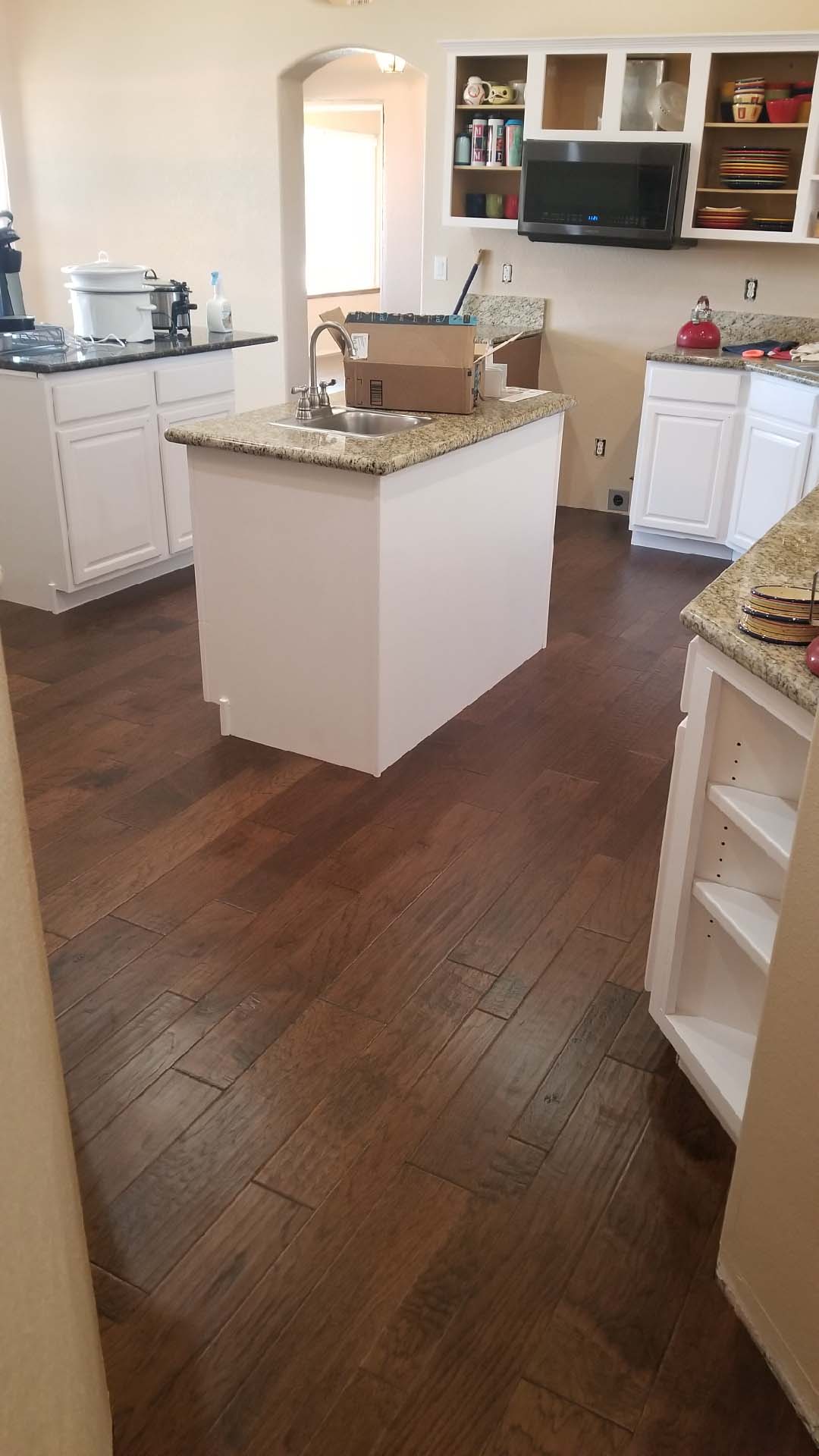 Hand scraped flooring in a kitchen