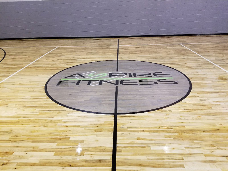 Completed hardwood floor and graphics