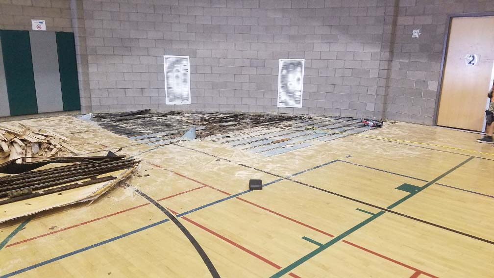 Gym floor water damage Gym floor water damage