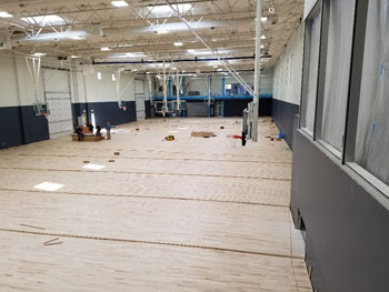 Laying the Maple wood flooring